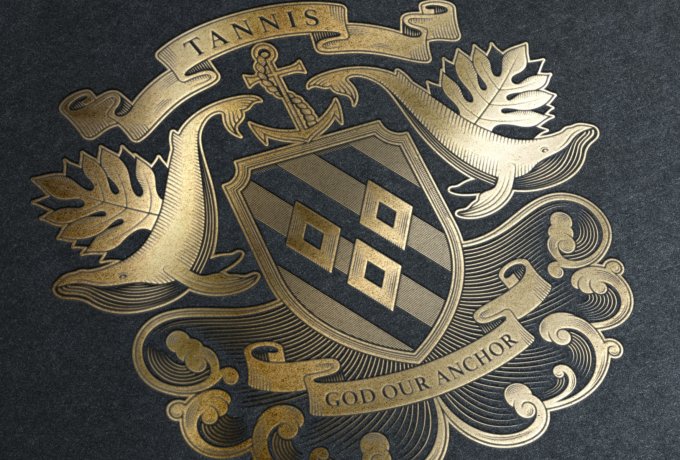 Tannis family crest shield whale design by Root Studio