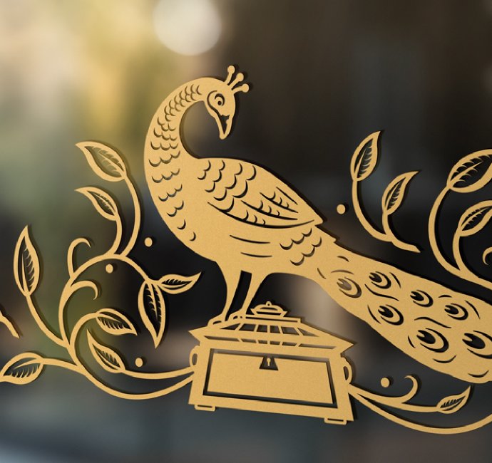 Hamira indian tearoom gold window graphic design with peacock by Root Studio