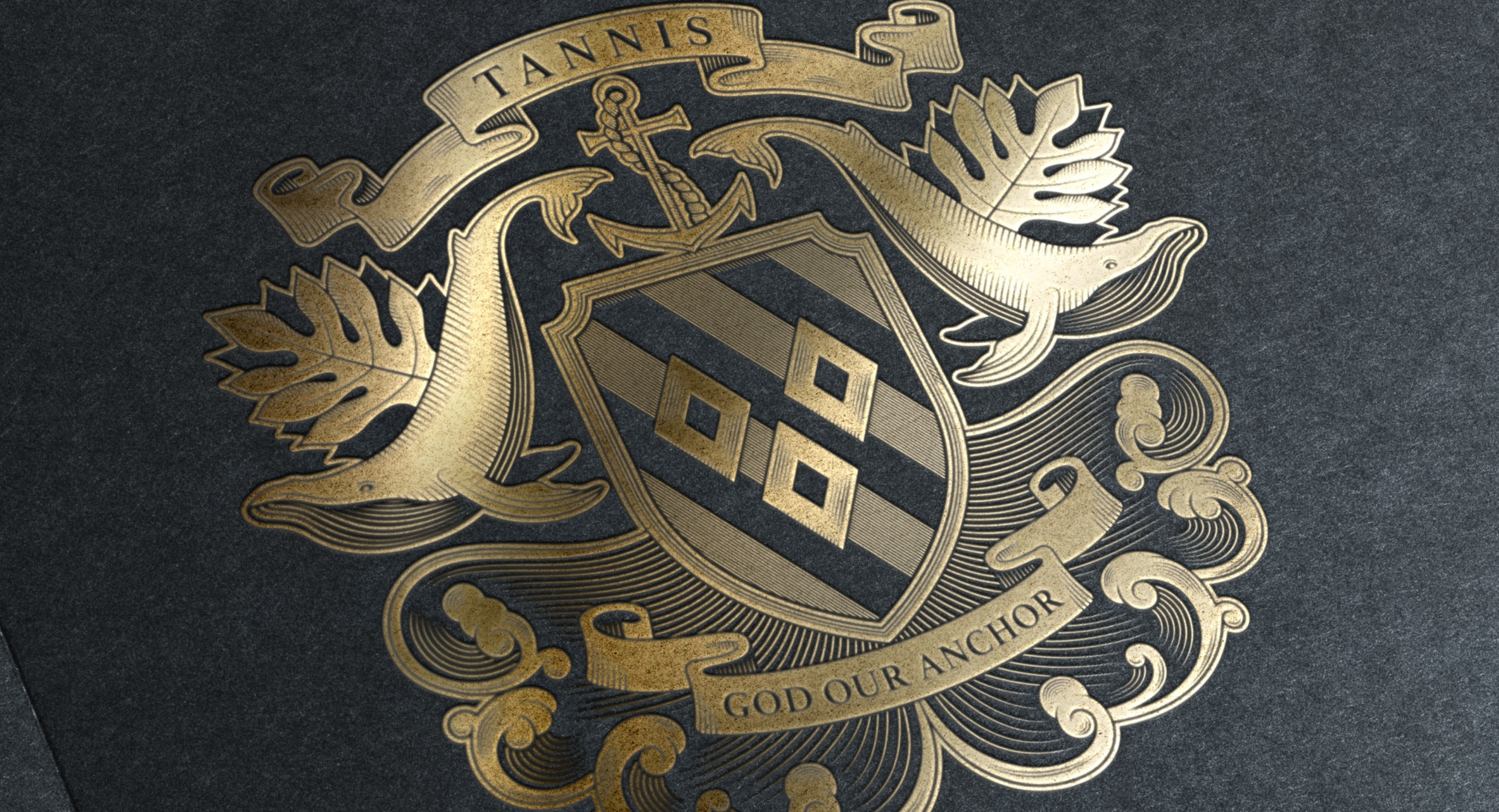 Tannis family crest shield whale design by Root Studio