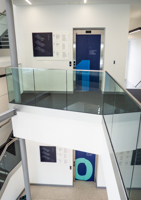 ASI College wayfinding lift door graphic signage