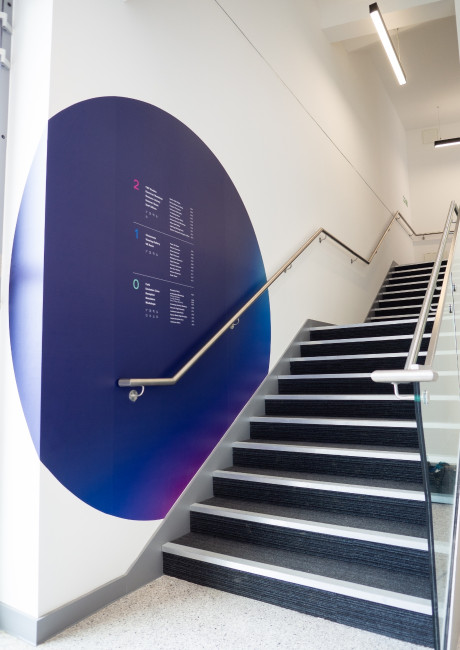 ASI college stairwell mural wayfinding design