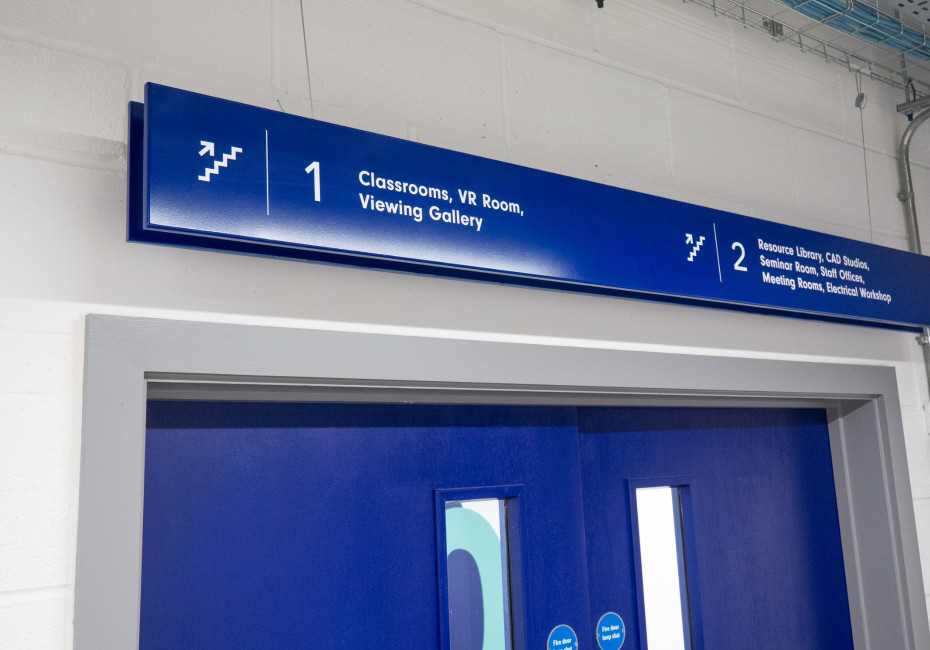 ASI college overhead hanging wayfinding signage design