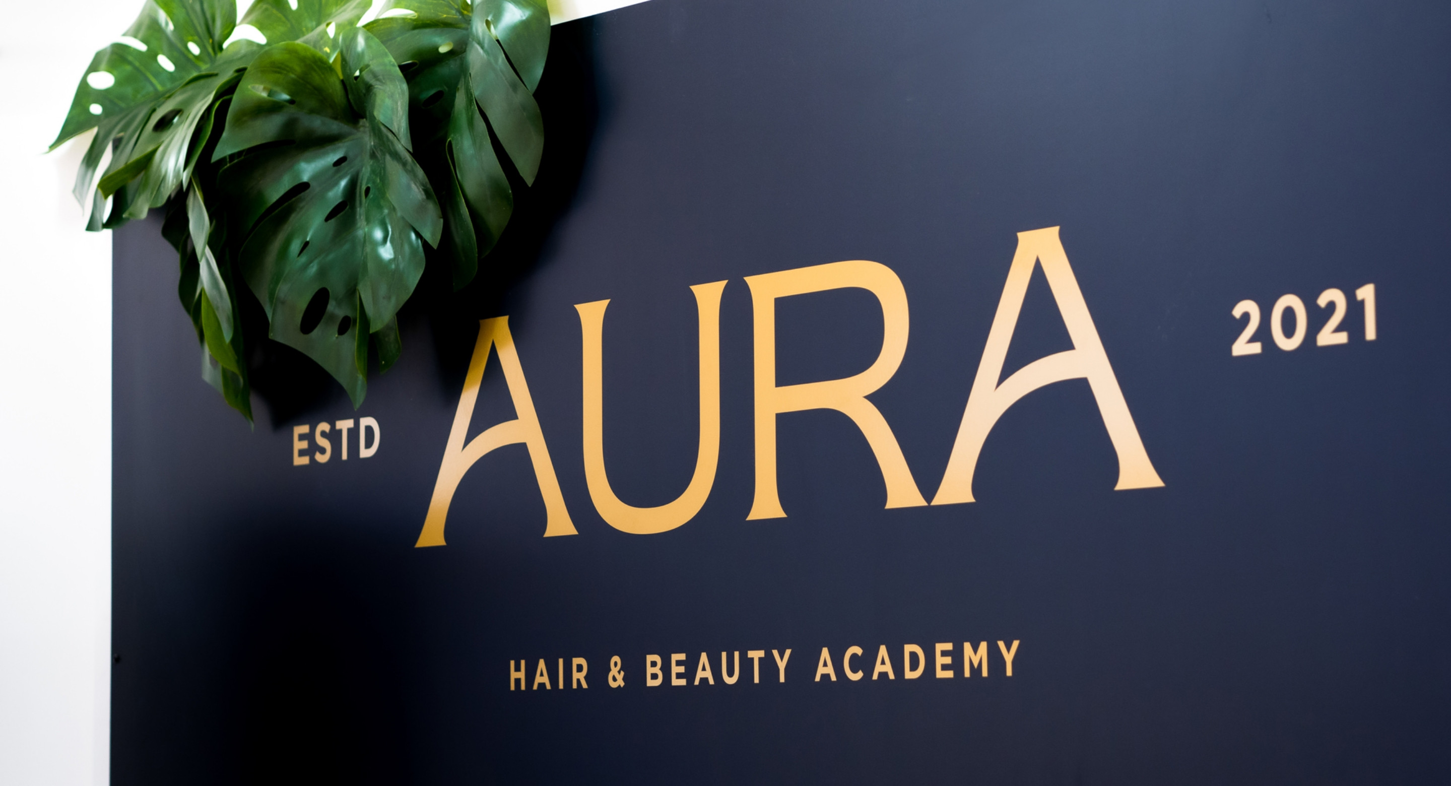 AURA Hair & Beauty logo signage design by Root Studio
