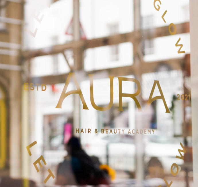 AURA Hair & Beauty logo gold window graphics design by Root Studio