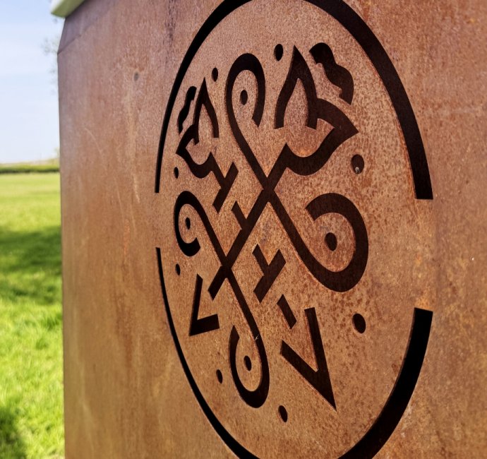 Bosworth 1485 Trail logo design laser cut into rusted steel