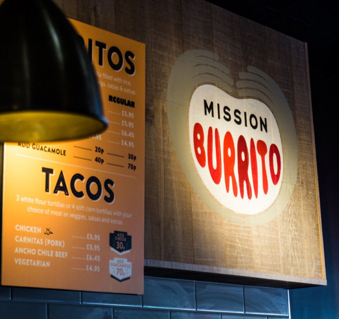 Wall mounted restaurant menu design by Root Studio