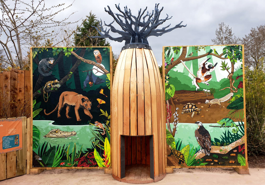 Large day and night illustrated panels with model baobab tree