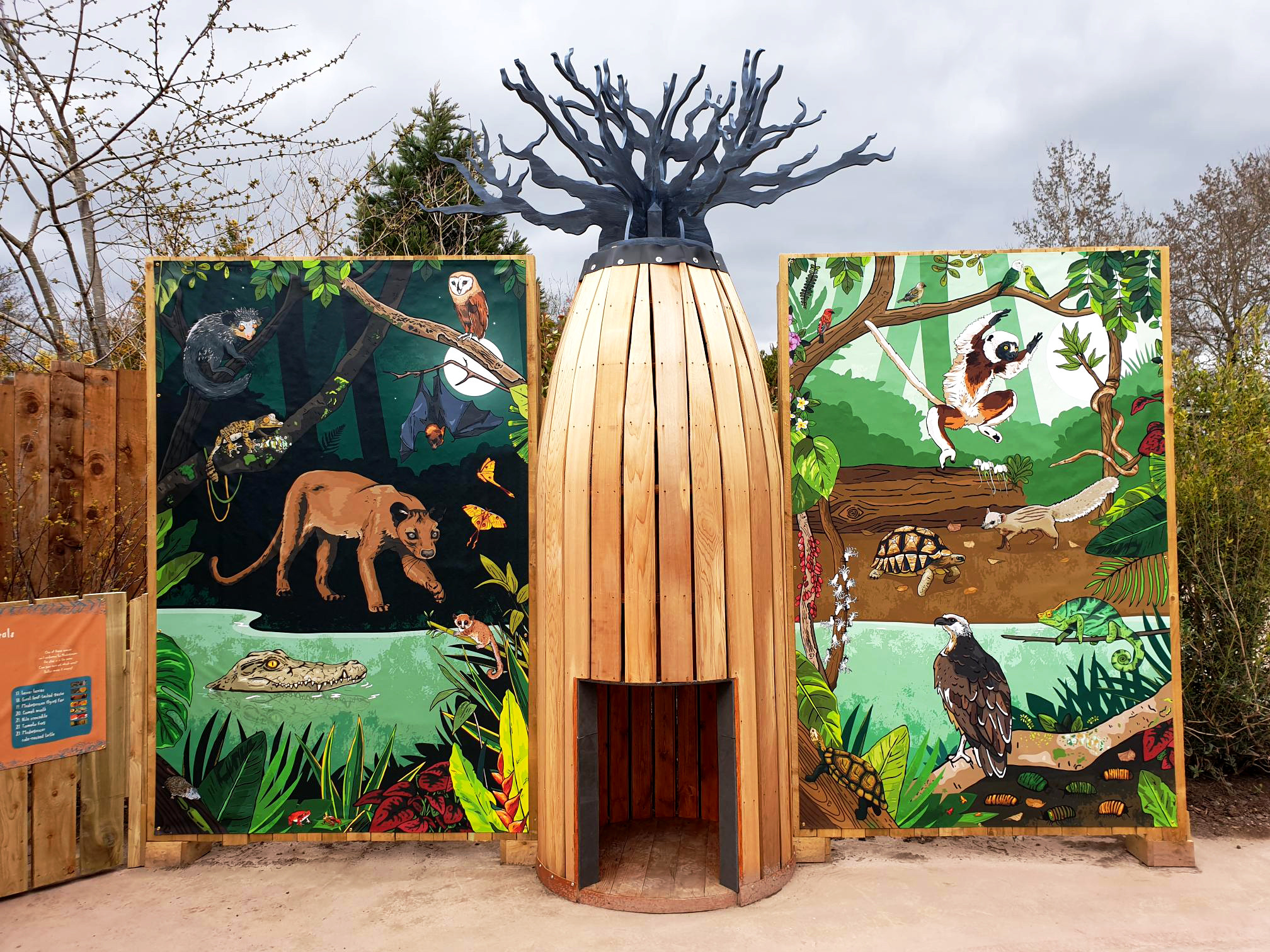 Large day and night illustrated panels with model baobab tree