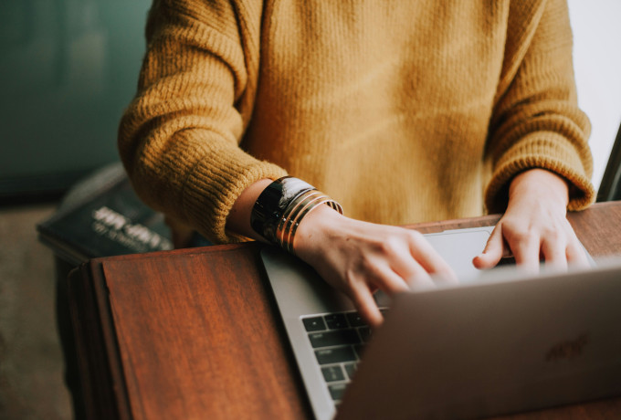 Writing content on laptop