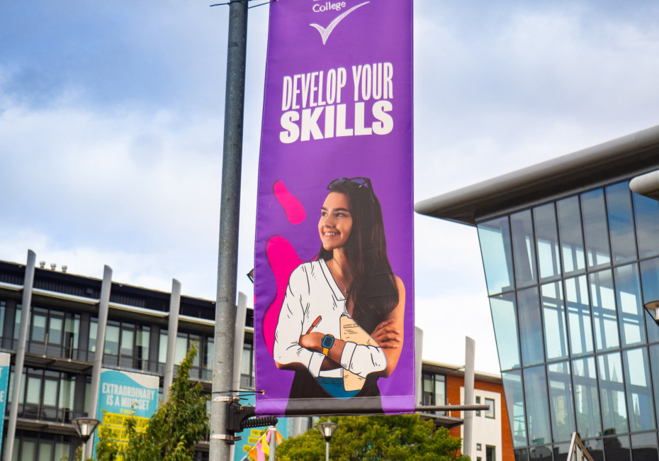 Lamp post flag banner design lincoln college education by root studio